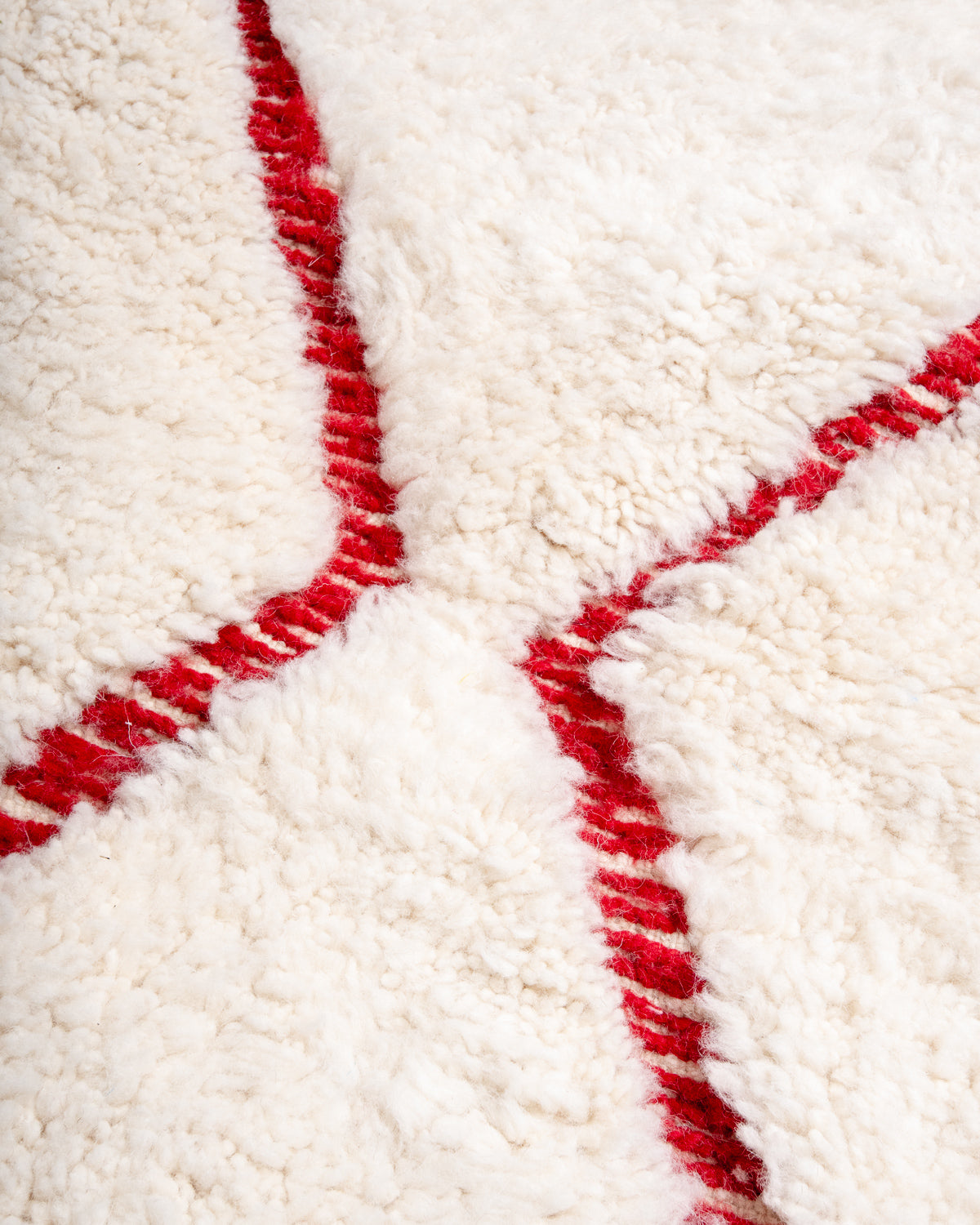 Modern, designer, handcrafted Berber rug from Morocco. Beniourain carpet with beautiful colours and patterns and fluffy wool texture.